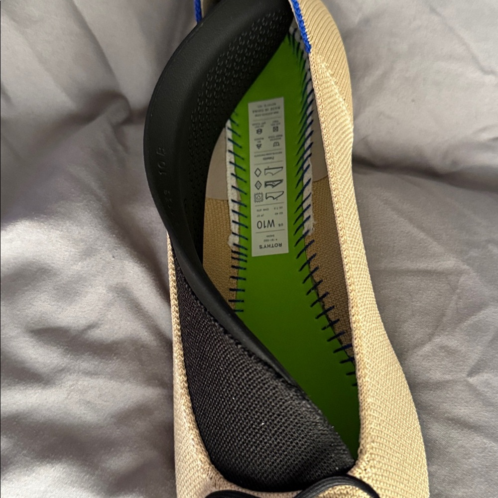 Rothy's Black and Cream Flats with Blue Accent - Picture 3 of 6